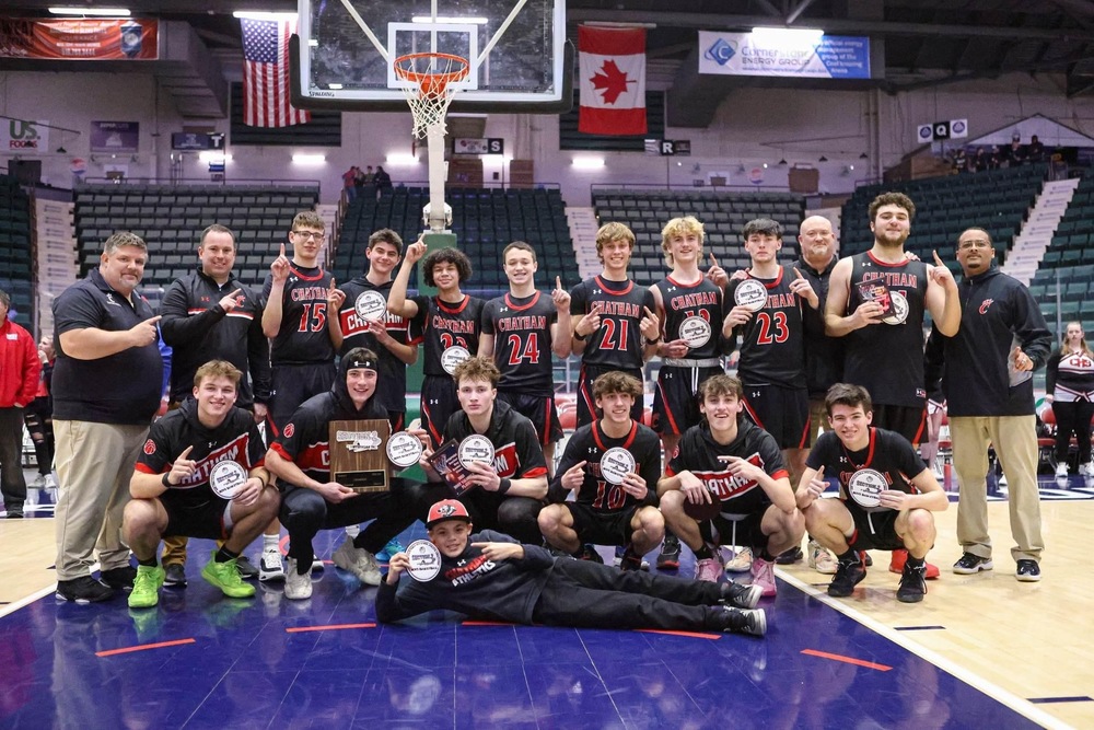 Chatham Boys basketball team with class CC trophies
