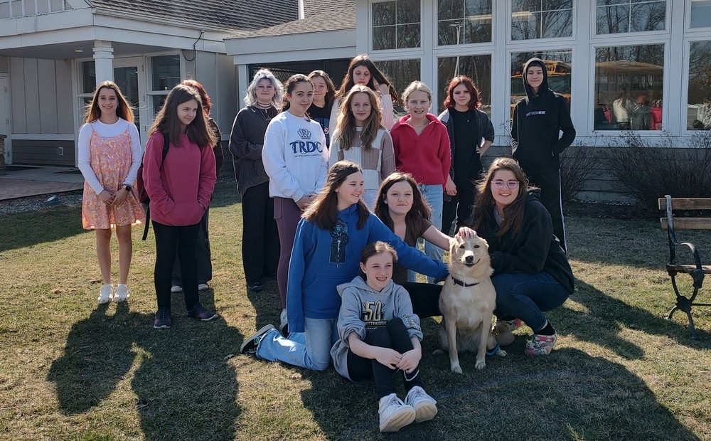 Service Club poses with dog in front of Columbia-Greene Humane Society