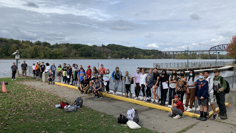 group shot of students by river