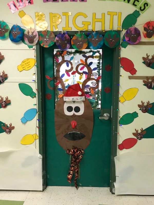 Door decorated as Rudolf the Red Nosed Reindeer