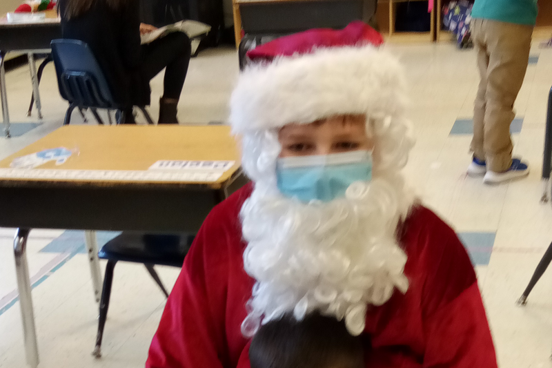 student dressed as Santa