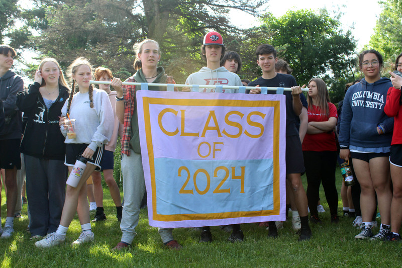 students holding Class of 2024 banner