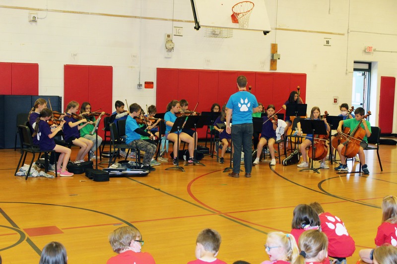 5th grade orchestra playing