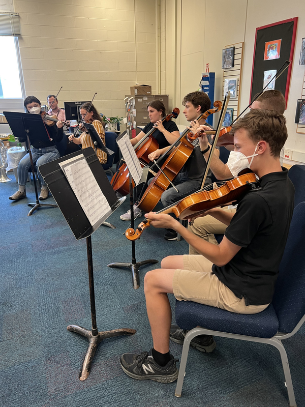 orchestra students playing