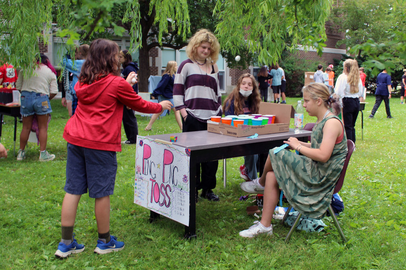 students playing carnival game