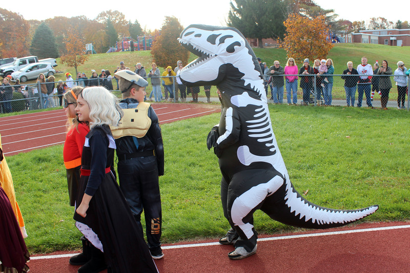 student dressed as skeleton T-rex