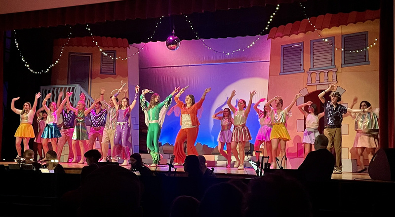 Dance scene in Chatham High School's production of MAMMA MIA!