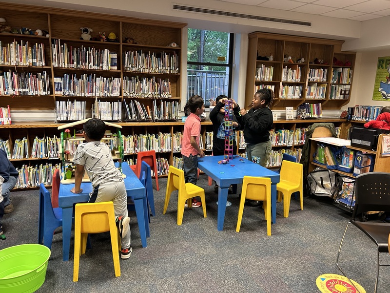 childrenplaying in library