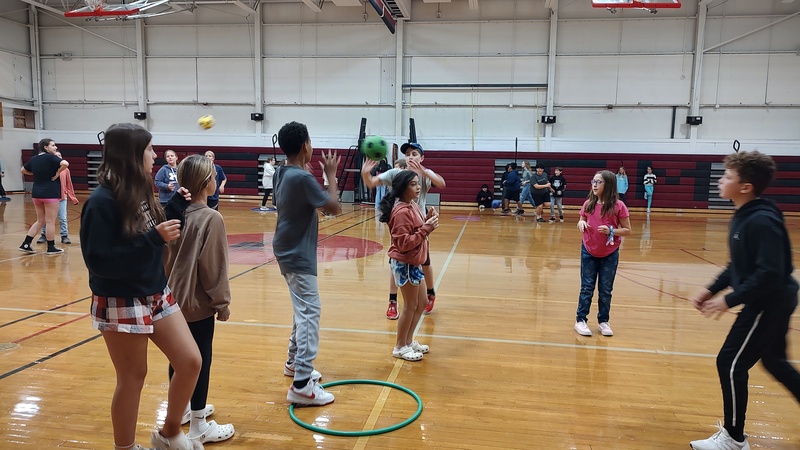 students playing games in gym