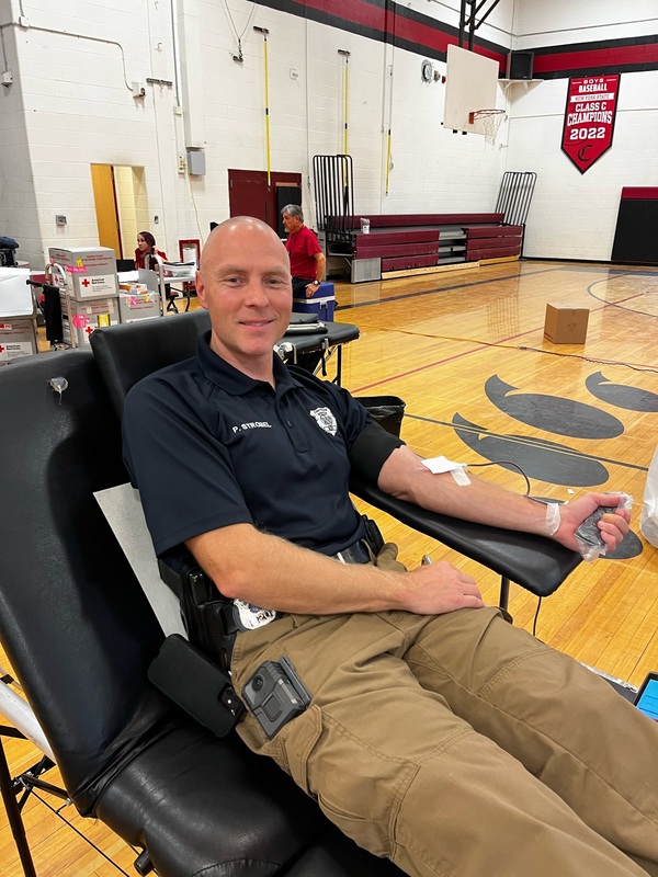police officer donating blood